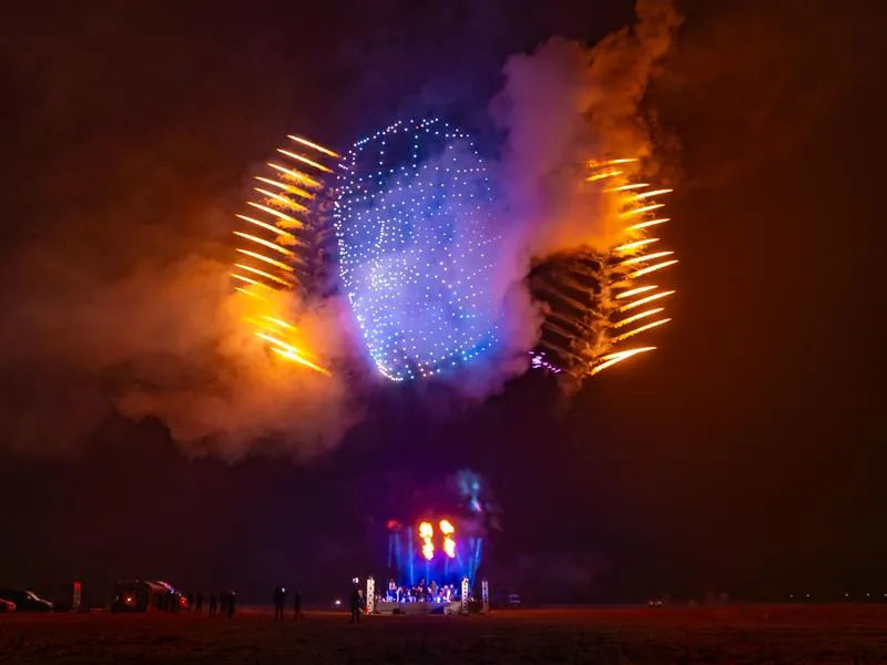 Pyrotechnic globe against night sky